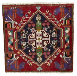 Full view of 1970s Shiraz rug from Iran / Persia, 50 × 51 cm in Red tones