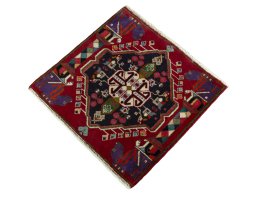 Corner detail of 1970s Shiraz rug showing border pattern and Wool pile