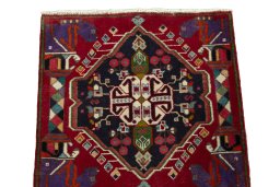 Surface texture of 1970s Shiraz rug with natural Wool and intricate pattern