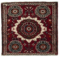 Full view of 1970s Shiraz rug from Iran / Persia, 60 × 57 cm in Red tones