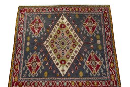 Surface texture of 1970s Shiraz rug with natural Wool and intricate pattern