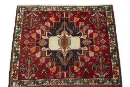 Surface texture of 1970s Shiraz rug with natural Wool and intricate pattern