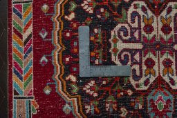 Backside of handmade 1970s Shiraz rug showing knot structure and weave density
