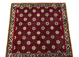 Surface texture of 1970s Shiraz rug with natural Wool and intricate pattern