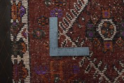 Backside of handmade 1970s Shiraz rug showing knot structure and weave density
