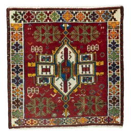 Full view of 1970s Shiraz rug from Iran / Persia, 70 × 67 cm in Red tones