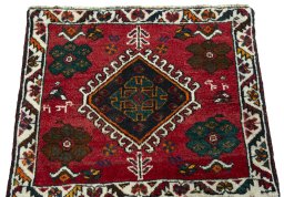 Surface texture of 1970s Shiraz rug with natural Wool and intricate pattern
