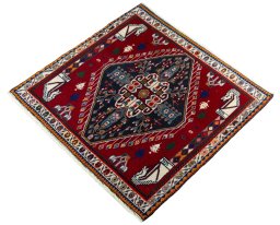 Corner detail of 1970s Shiraz rug showing border pattern and Wool pile