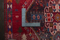 Backside of handmade 1970s Shiraz rug showing knot structure and weave density