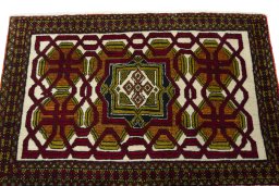 Surface texture of 1970s Shiraz rug with natural Wool and intricate pattern