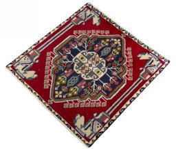 Corner detail of 1970s Shiraz rug showing border pattern and Wool pile