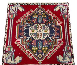 Surface texture of 1970s Shiraz rug with natural Wool and intricate pattern