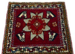 Surface texture of 1970s Shiraz rug with natural Wool and intricate pattern