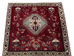 Surface texture of 1970s Shiraz rug with natural Wool and intricate pattern