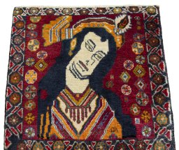 Surface texture of 1970s Shiraz rug with natural Wool and intricate pattern