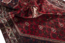 Close-up detail of 2000s Shiraz rug from Iran / Persia showing Wool weave