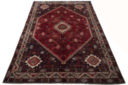 Surface texture of 2000s Shiraz rug with natural Wool and intricate pattern