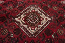 Central medallion detail of 2000s Shiraz rug from Iran / Persia