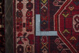 Surface texture of 2000s Shiraz rug with natural Wool and intricate pattern