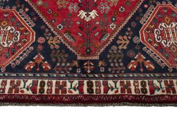 Close-up detail of 2000s Shiraz rug from Iran / Persia showing Wool weave