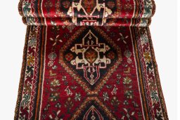 Full view of 2000s Shiraz rug from Iran / Persia, 322 × 85 cm in Red tones