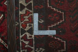 Surface texture of 2000s Shiraz rug with natural Wool and intricate pattern