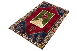 Corner detail of 2000s Shiraz rug showing border pattern and Wool pile