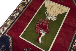 Backside of handmade 2000s Shiraz rug showing knot structure and weave density