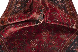 Close-up detail of 2000s Shiraz rug from Iran / Persia showing Wool weave