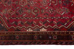 Full view of 2000s Shiraz rug from Iran / Persia, 275 × 180 cm in Red tones