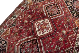 Backside of handmade 2000s Shiraz rug showing knot structure and weave density