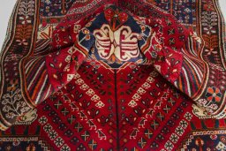 Close-up detail of 2000s Shiraz rug from Iran / Persia showing Wool weave