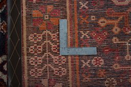 Surface texture of 2000s Shiraz rug with natural Wool and intricate pattern
