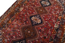 Backside of handmade 1970s Shiraz rug showing knot structure and weave density