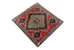 Corner detail of 2000s Shiraz rug showing border pattern and Wool pile