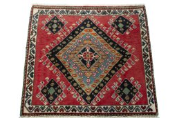 Surface texture of 2000s Shiraz rug with natural Wool and intricate pattern