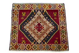 Surface texture of 2000s Shiraz rug with natural Wool and intricate pattern