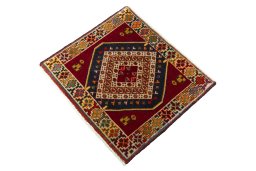 Corner detail of 2000s Shiraz rug showing border pattern and Wool pile