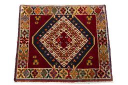 Surface texture of 2000s Shiraz rug with natural Wool and intricate pattern