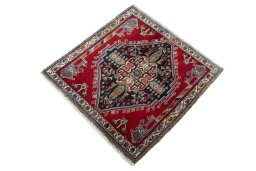 Corner detail of 2000s Shiraz rug showing border pattern and Wool pile
