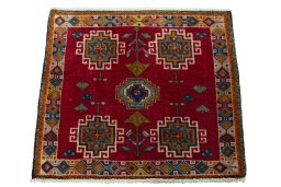 Surface texture of 2000s Shiraz rug with natural Wool and intricate pattern
