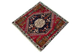 Corner detail of 2000s Shiraz rug showing border pattern and Wool pile