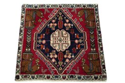 Surface texture of 2000s Shiraz rug with natural Wool and intricate pattern