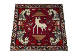 Surface texture of 2000s Shiraz rug with natural Wool and intricate pattern