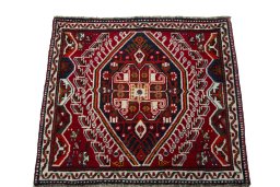 Surface texture of 2000s Shiraz rug with natural Wool and intricate pattern