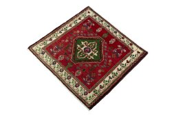 Corner detail of 2000s Shiraz rug showing border pattern and Wool pile