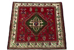 Surface texture of 2000s Shiraz rug with natural Wool and intricate pattern