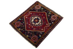 Corner detail of 2000s Shiraz rug showing border pattern and Wool pile