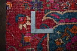Backside of handmade 2000s Shiraz rug showing knot structure and weave density