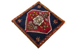 Corner detail of 2000s Shiraz rug showing border pattern and Wool pile